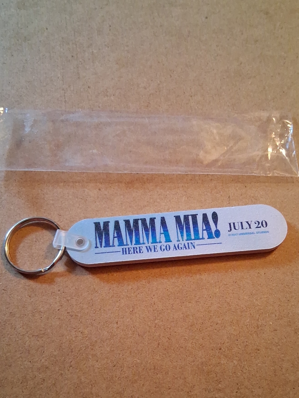 Here We Go Again White & Blue Keychain - Official Promo